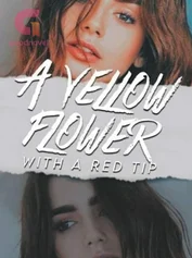 A YELLOW FLOWER WITH A RED TIP